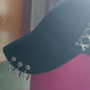 The coolest hat with piercings! Yep piercings on a hat!" Rare"